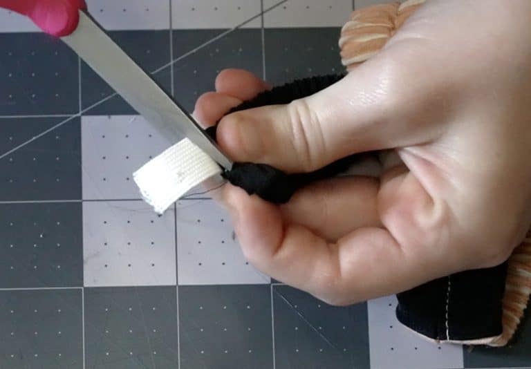 pull the fabric back and cut the elastic