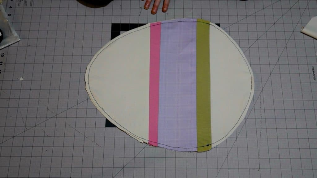 sandwich interfacing between the two sides and sew around perimeter
