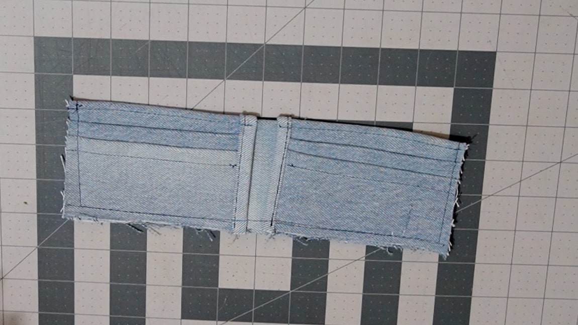 fold over the upper side of the pocket