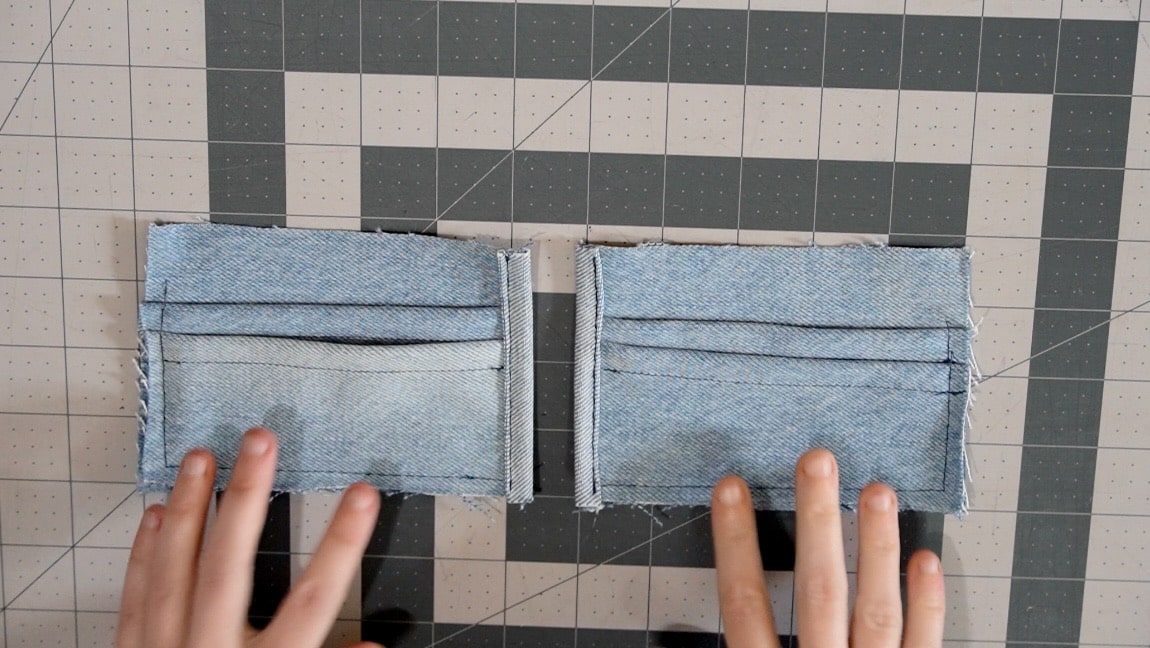 reverse-hem the inner side of the side pocket pieces over top of the stacked pockets