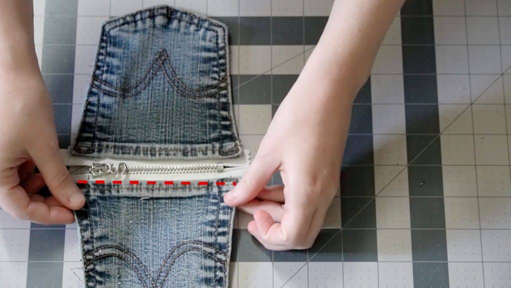 add zipper to upper edge of pockets
