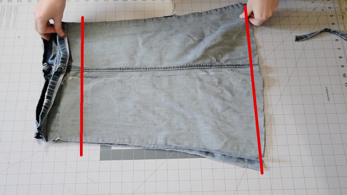 line up two legs of pants and cut them to match