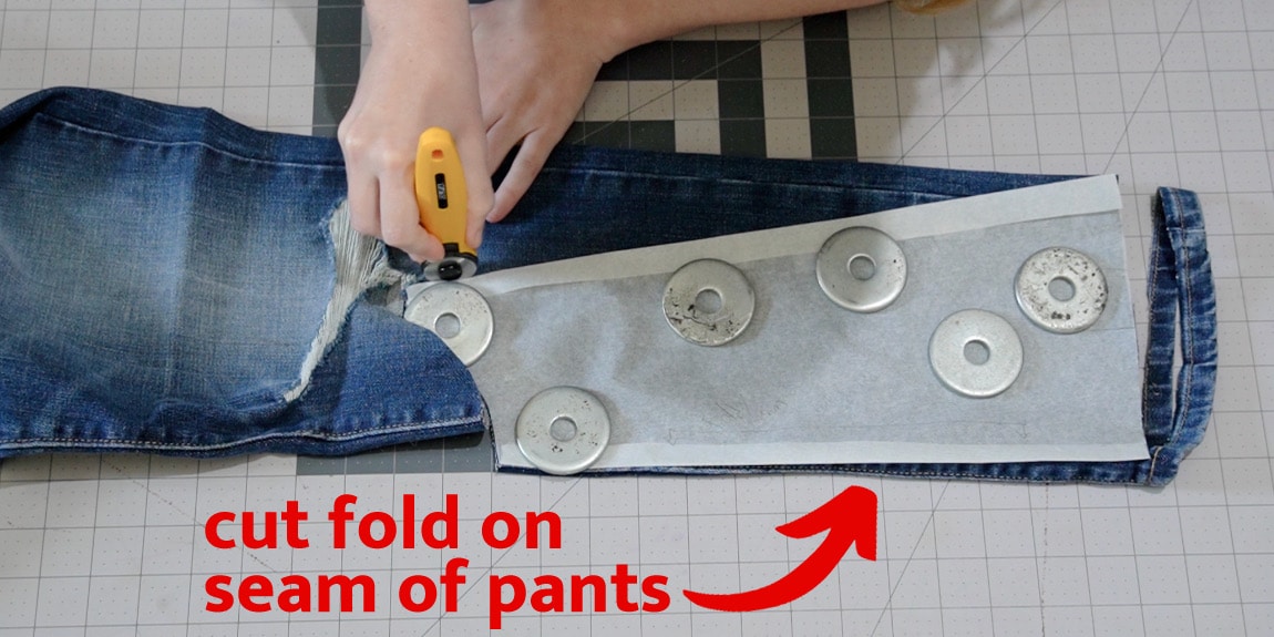 cut pattern on fold of jeans