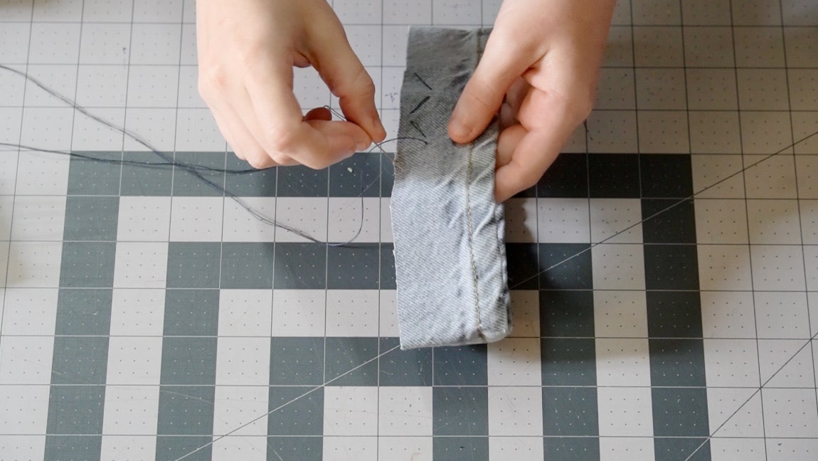 hand sew a wide zig zag basting stitch