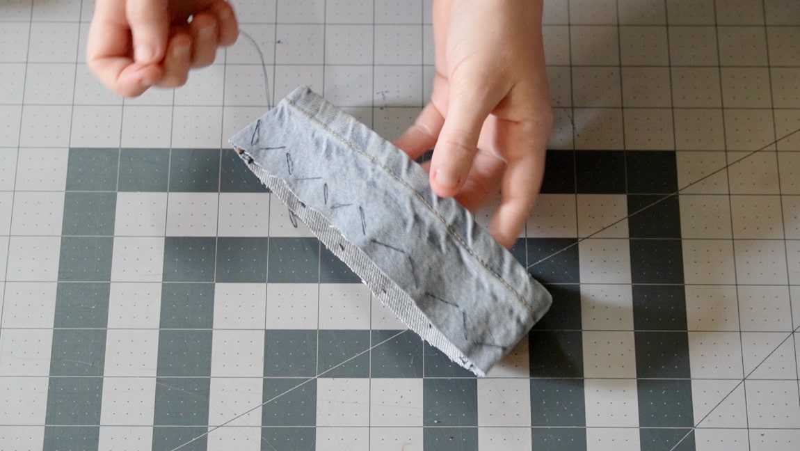 hand sew a wide zig zag basting stitch