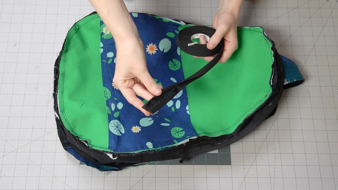 use double fold bias tape to encase the seams to finish it