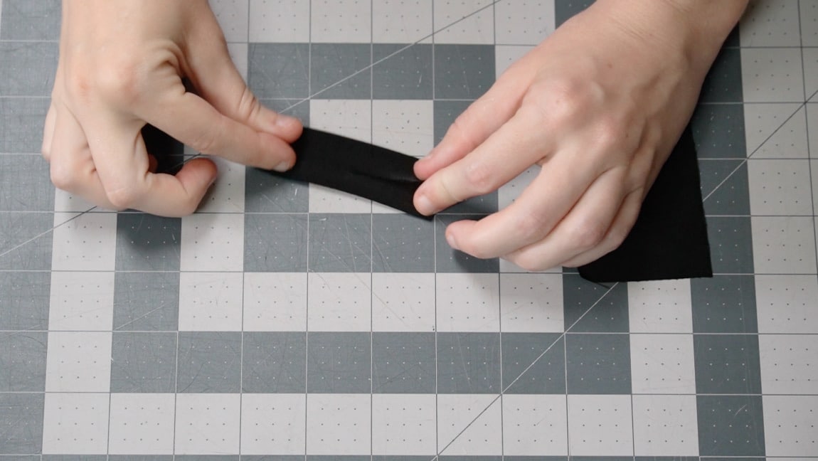 fold the sides of the tab to the center