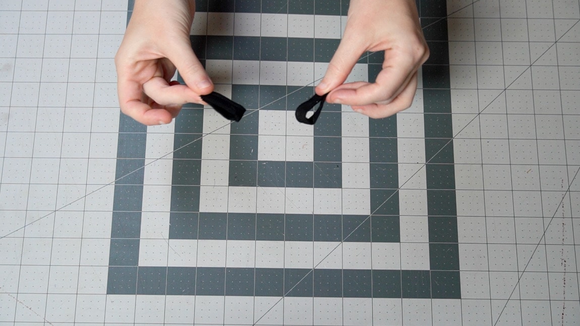 fold tab in half