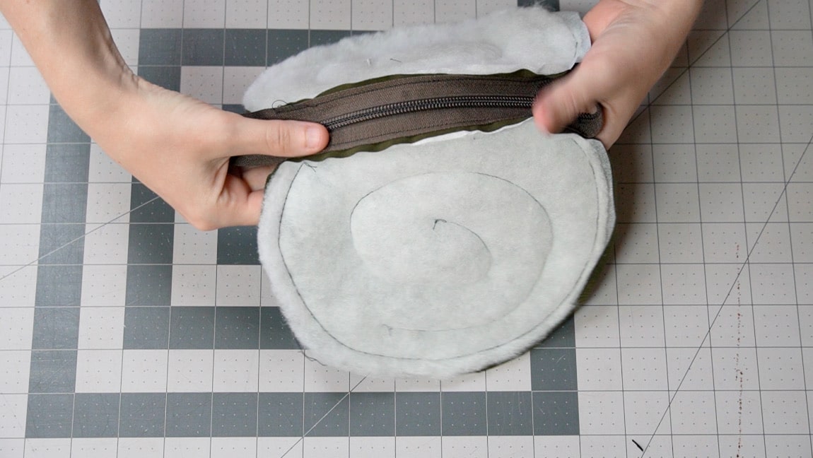 sew zipper face down on shell pieces