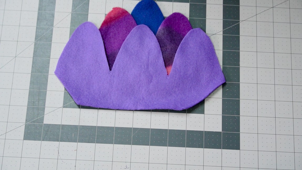 place third fleece piece 1 inch above second