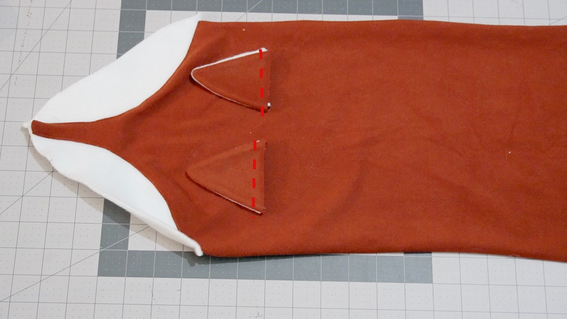 sew ears face down on scarf