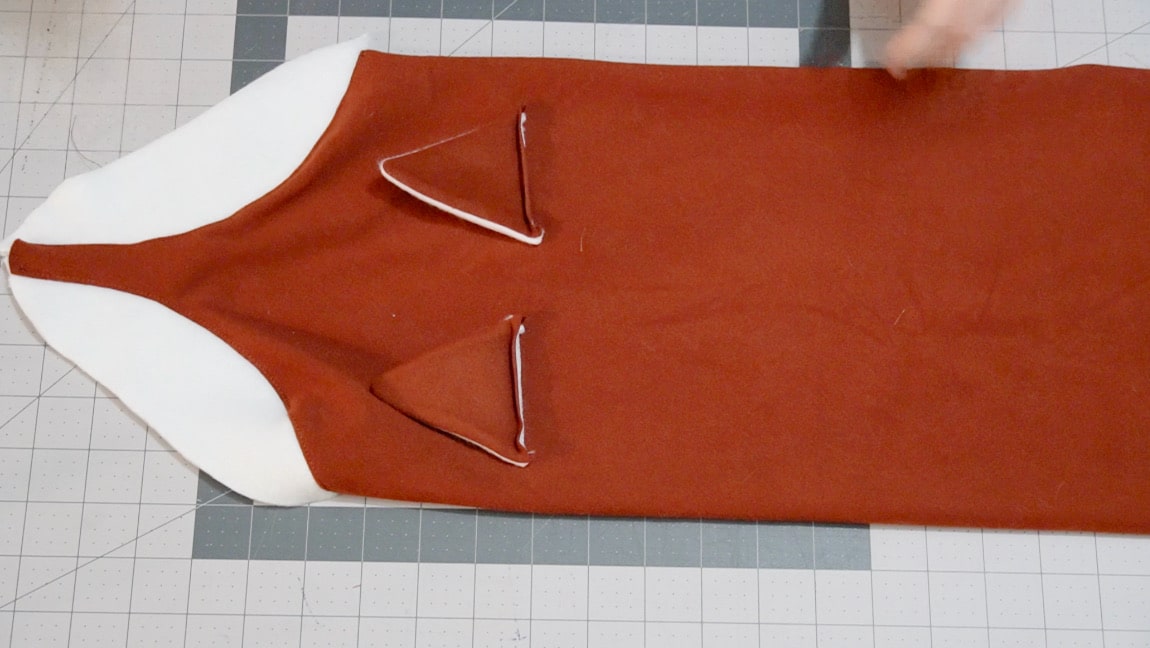 sew ears face down on scarf