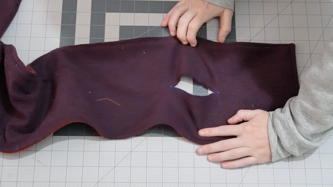 sew the slot with a buttonhole stitch