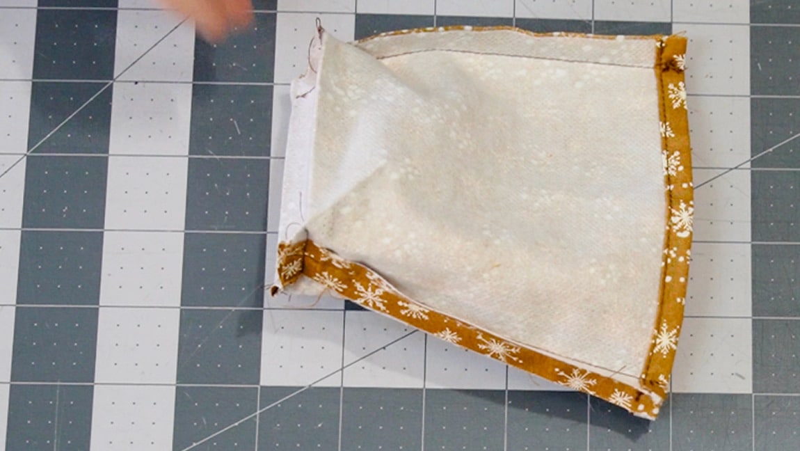 fold the corner together and sew