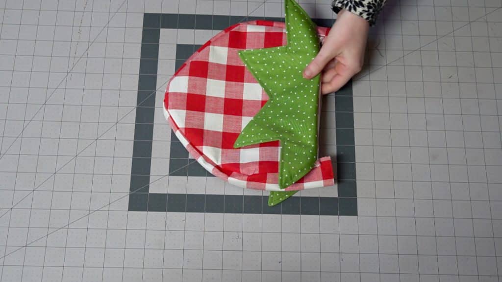 fold greens over to the front and top stitch