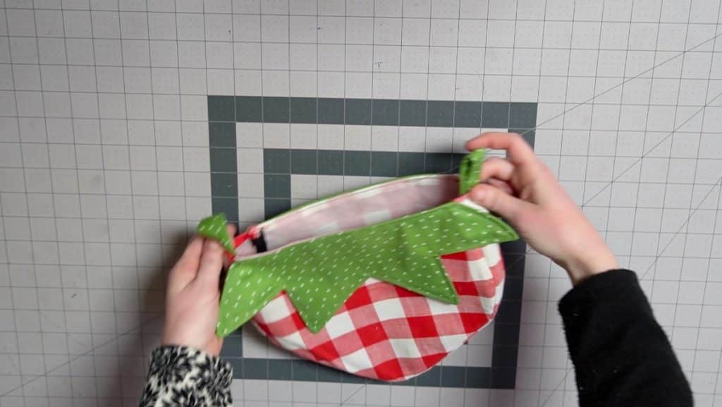 sew tabs to sides of the purse