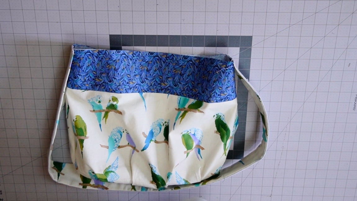 baste strap to sides of bag