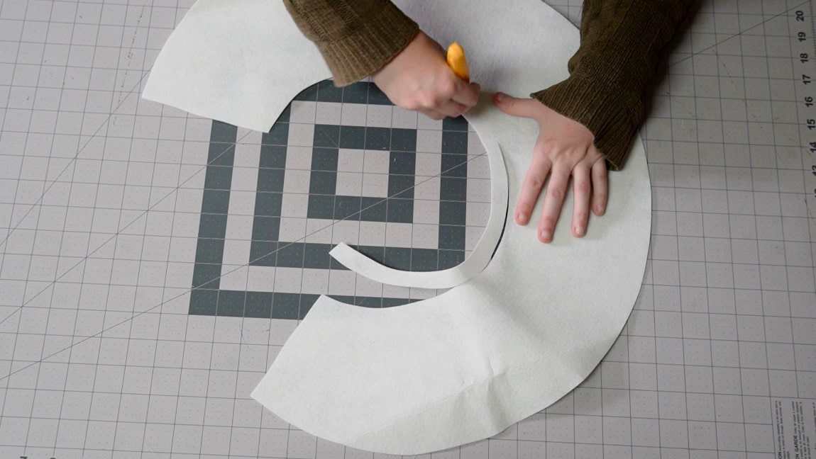 trip seam allowance from brim interfacing