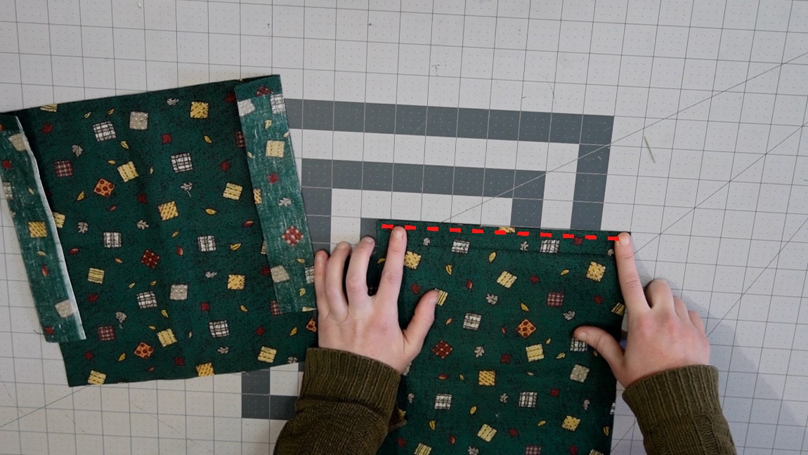 fold over and baste one side of both pockets so they mirror each other