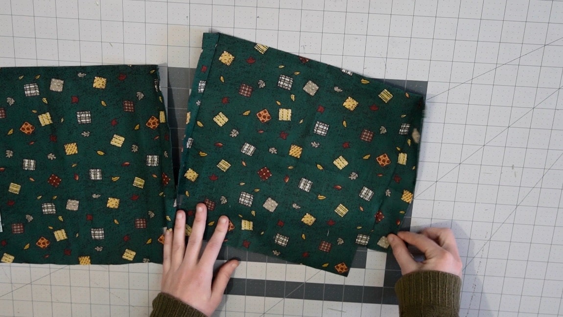 fold over and baste one side of both pockets so they mirror each other