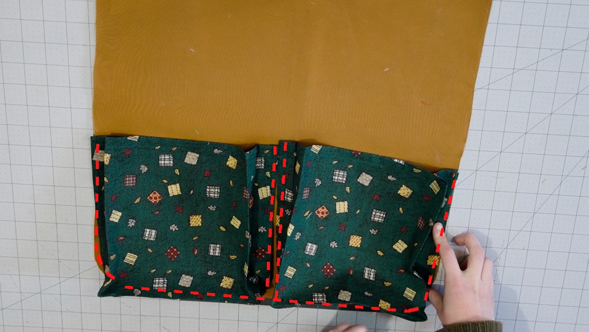 sew the pockets to the background