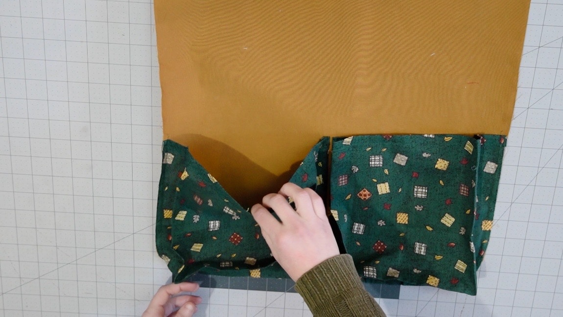 sew the pockets to the background