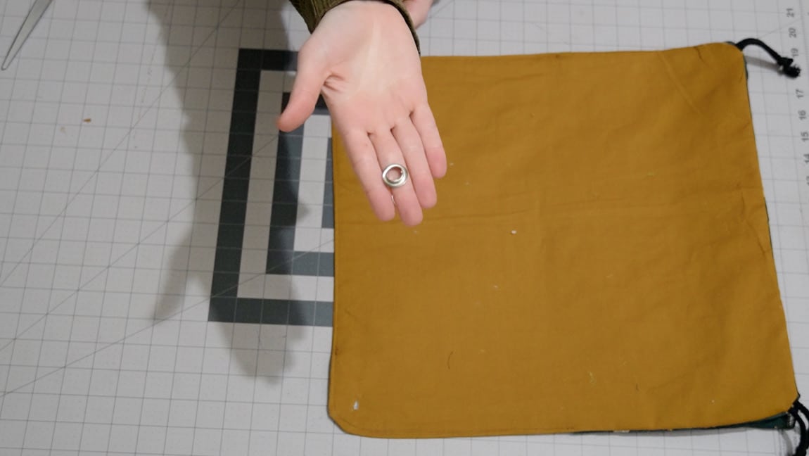 add the grommet pieces