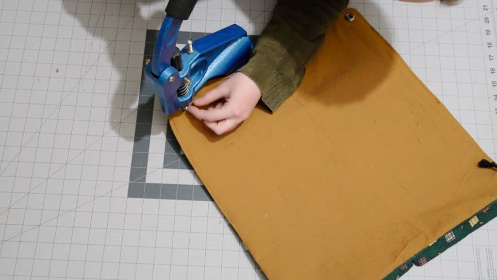 press the grommets together with a press