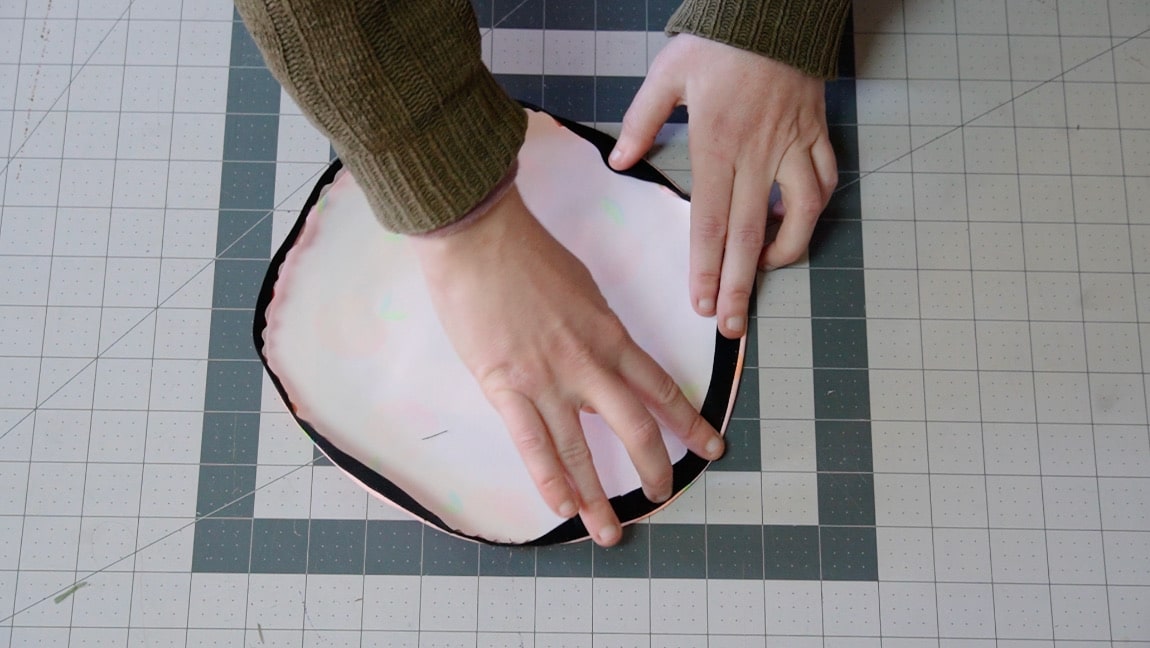 turn bias tape to the wrong side and sew