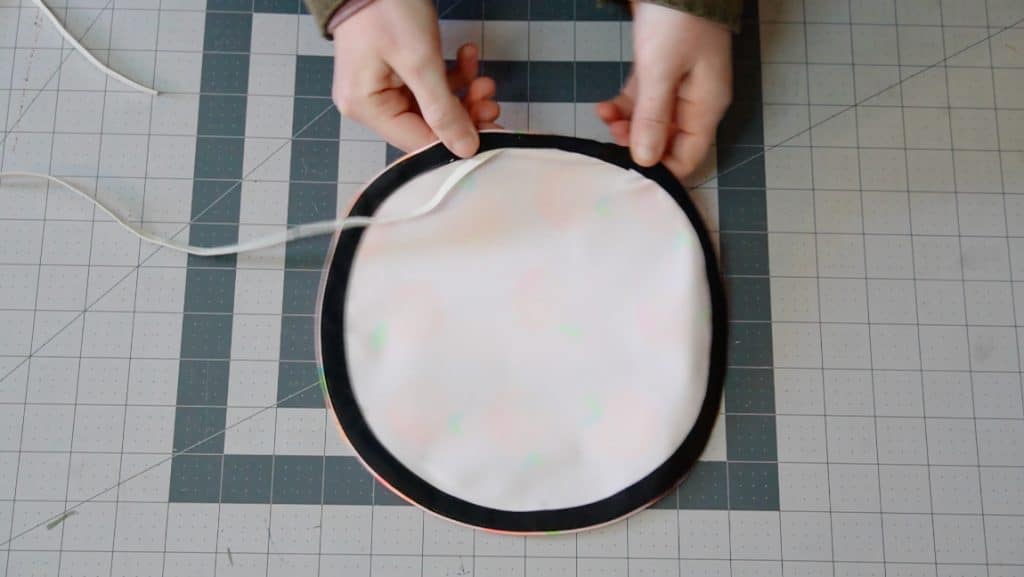 add elastic to the bias tape casing