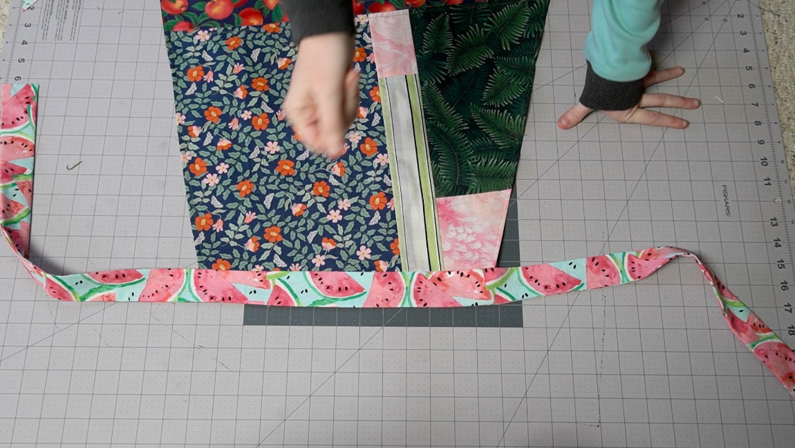 press the waistband away from the skirt