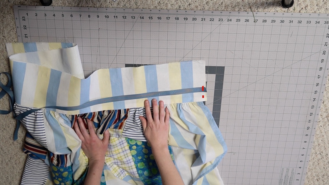 add a ribbon to one side of the waistband