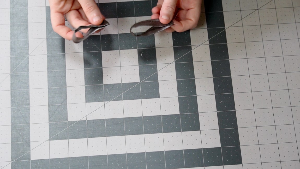 fold tabs in half