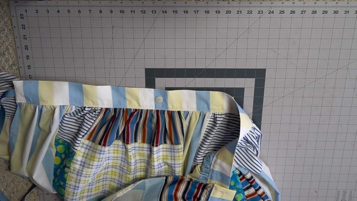 sew the button in place