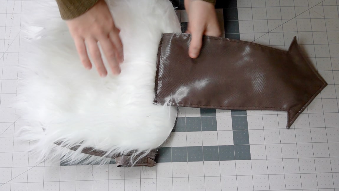fold over stitch line and sew