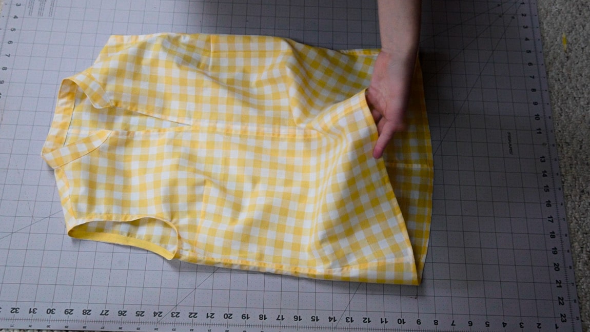 hem the bottom of the shirt