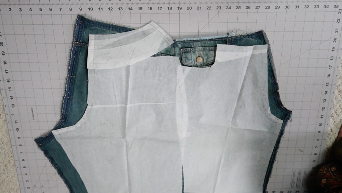 place a pants pattern on the jeans lining up the crotch lines