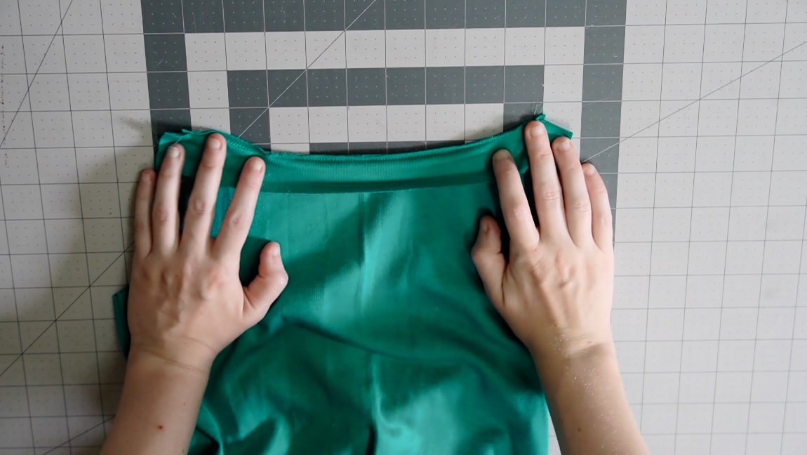 sew the top binding, stretching as you go