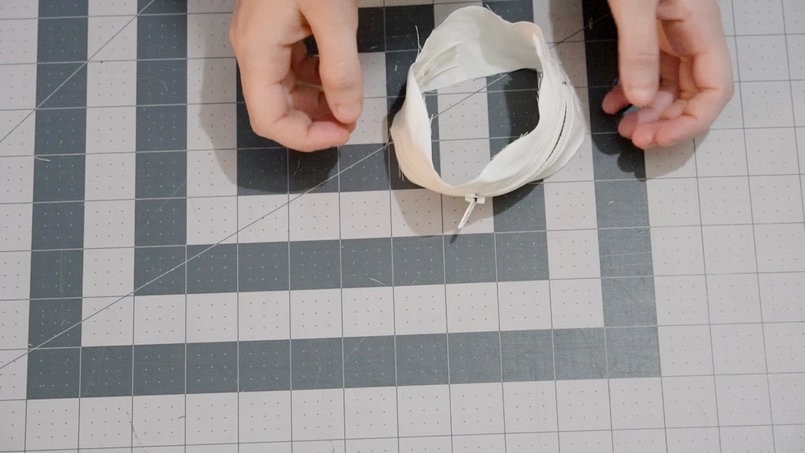 sew the base to the zipper