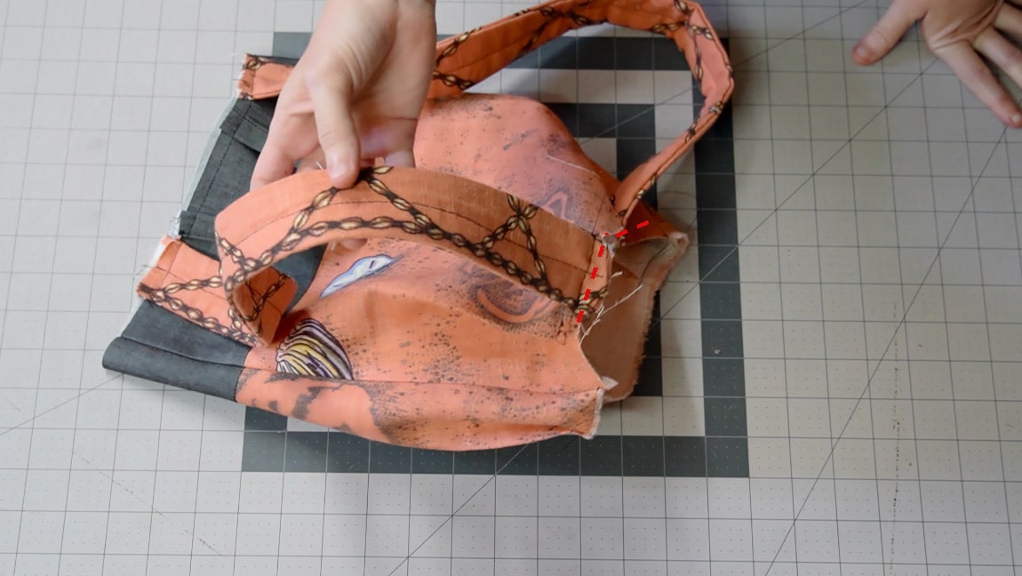 baste straps to bottom of bag