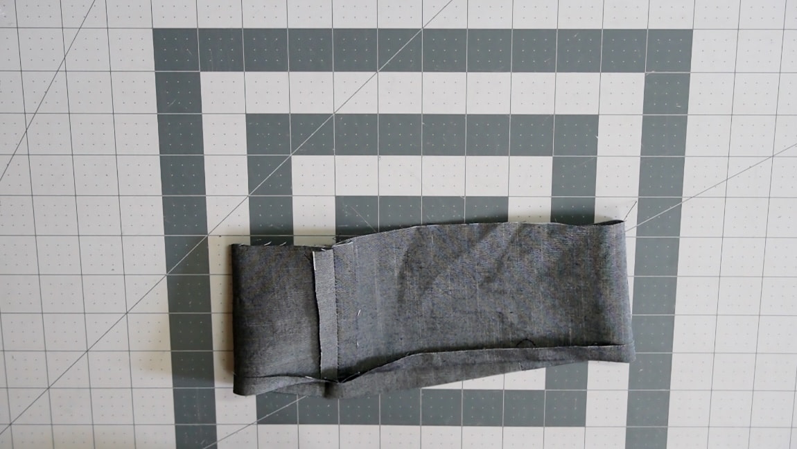 press the seam allowance of the facing