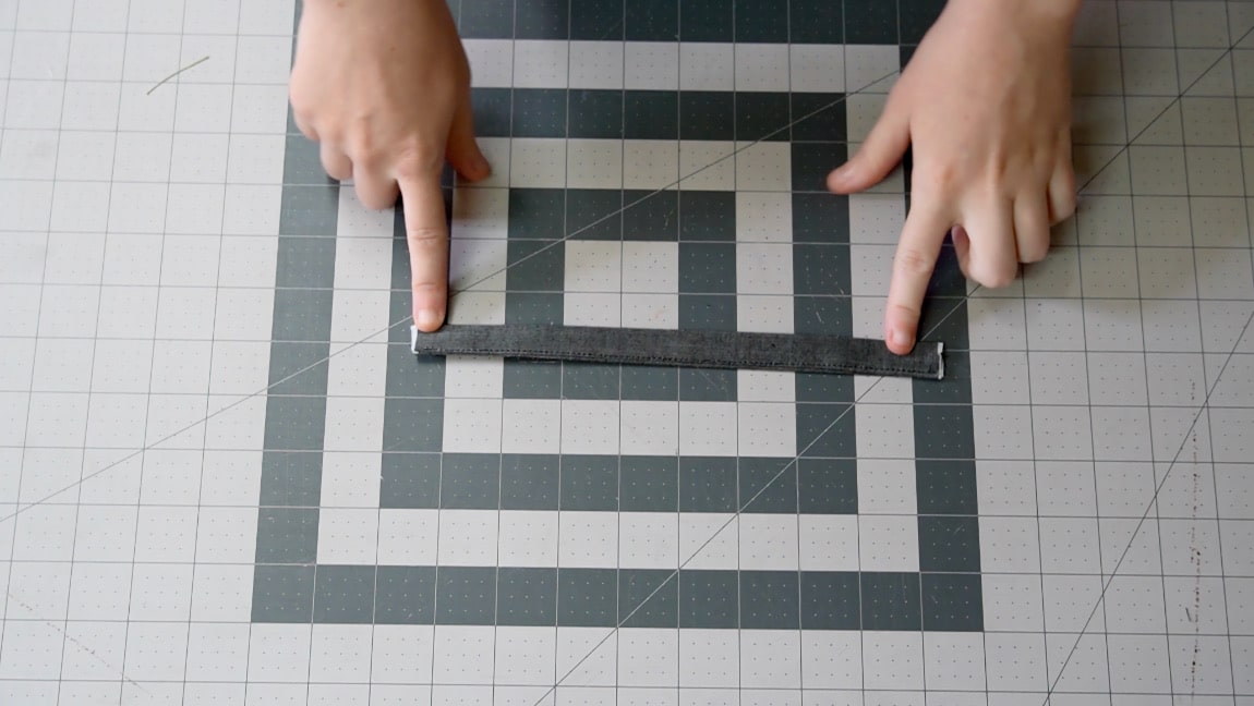 fold the handle in half and sew