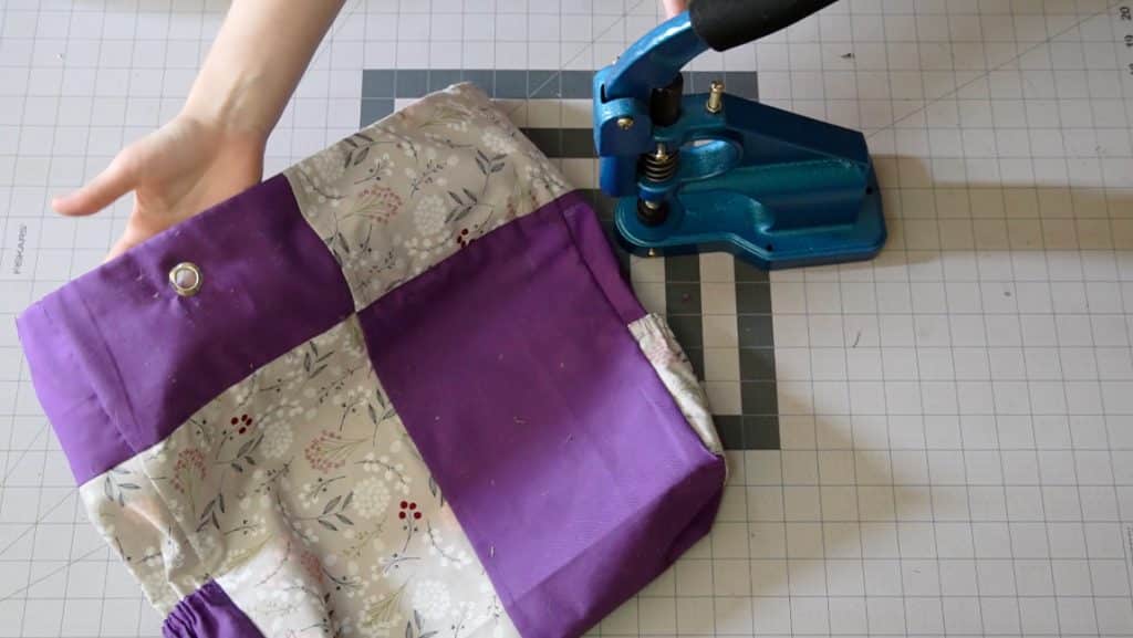 press grommets in place