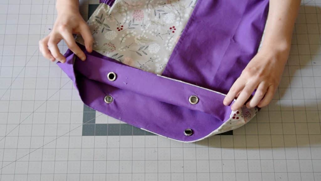 press grommets in place