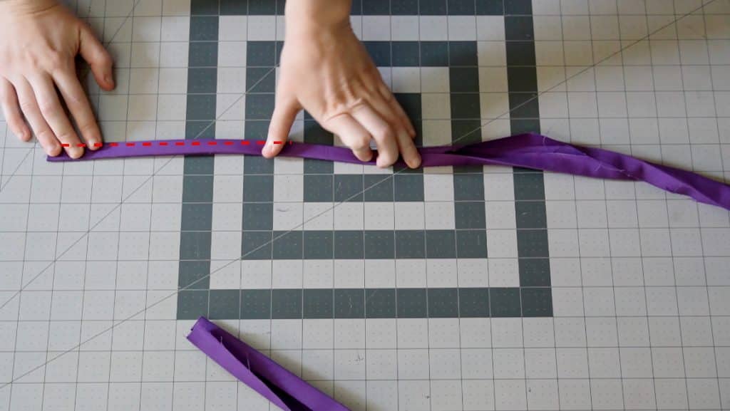 fold straps in quarters and half