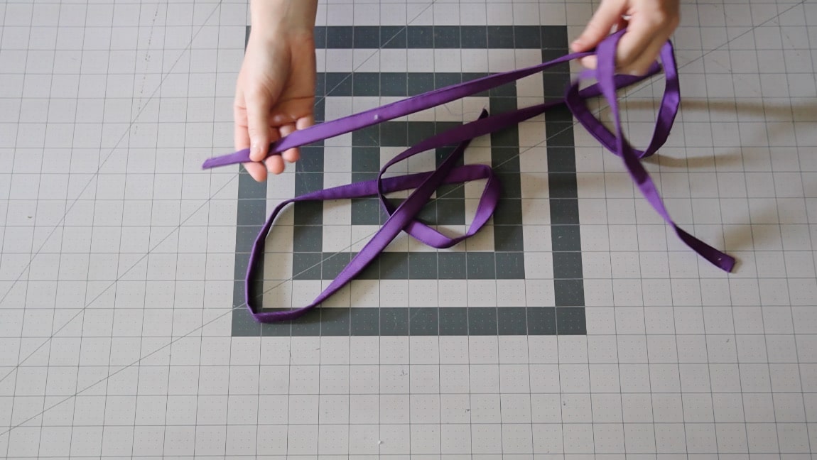 fold straps in quarters and half